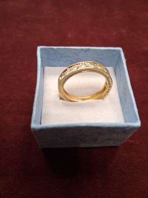 Bague en or 18 carats 750/1000° sertie de 10 petits diamants