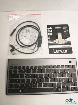 a keyboard and a mouse sitting on a table