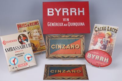 several different types of advertising signs are displayed on a white surface