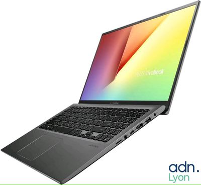 the asus vivobook 15 laptop is open and ready to use