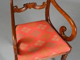 an image of a chair with a red and gold upholstered seat