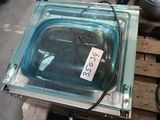 a glass container with a price tag on it on a pallet