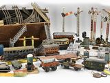 On voit sur cette photo de nombreux types différents de petits trains et de petits camions