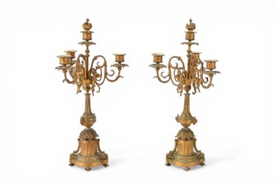 pair of antique brass candelabs with candlesticks on stands