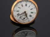 an antique pocket watch with roman numerals and roman numerals on the dial