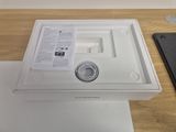 a white box with a glass of wine on top of it