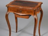 an image of a small table with a drawer on it