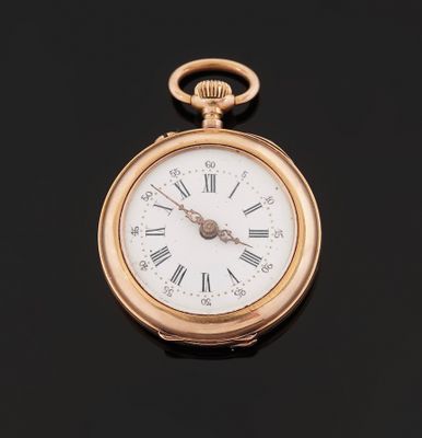 an antique gold pocket watch with roman numerals and roman numerals