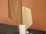 wooden utensils and cutting boards are on a counter top