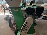 a small machine that is sitting in a garage