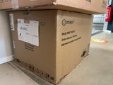 a cardboard box sitting on top of a cardboard box on the floor