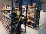 a large rack with many items in it in a warehouse