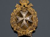 an image of a gold medal with a star on it