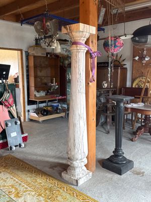 an image of a living room with a lot of stuff on the floor