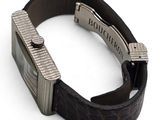 a watch that is sitting on top of a black leather strap