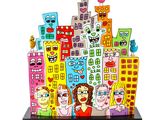 une image représentant une sculpture d'une ville avec des personnages
