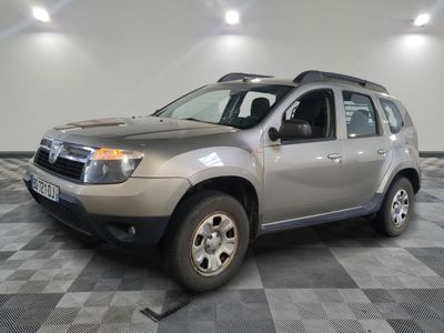 a picture of a silver suv parked in a garage