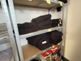 a lot of clothes that are on the shelves in the room