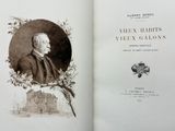 an open book with a picture of a man in a suit and tie