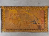 an old tapestry hanging on a wall with a painting of a man and a woman