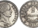 a close up of a coin on a white background