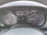 a close up of a car dashboard with a speedometer and gauges