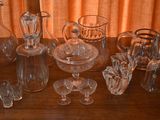 a lot of glass items that are on a table