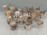 many different types of beer mugs on the table