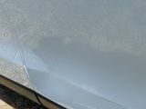 a close up of a car ' s door handle and the door handle is missing