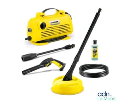 a yellow pressurer with a hose and other cleaning supplies