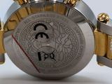 an image of a close up of a watch on a white surface
