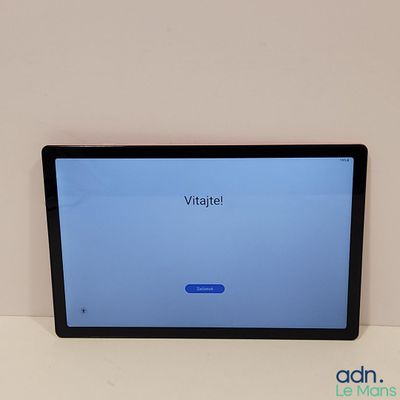 une tablette posée sur une table, avec le mot « vigile » affiché à l'écran