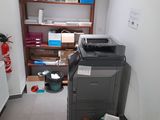 an image of a room with a printer and other things in it
