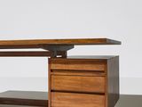 a close up of a desk with a drawer underneath it