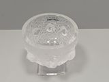 an image of a clear glass bowl with a flower design on it