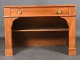 an old wooden desk with a shelf on top of it