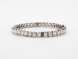 a white gold and diamond tennis bracelet
