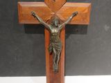 wooden crucifix with jesus on the cross on a stand