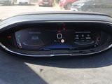 the dashboard of a car with a digital display in the center