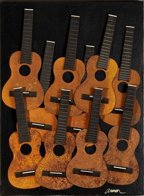 de nombreuses guitares exposées dans une vitrine-cadre
