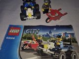 a picture of a lego city set with a car and a motorcycle