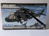 a box of legos with a picture of a helicopter on it