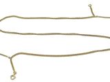 a close up of a gold chain on a white background