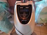 a machine that is sitting on the floor in the room