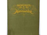 a green book with gold lettering on the cover of a book
