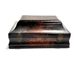 a black box with a floral design on it