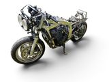 a motorcycle that is sitting on a white surface