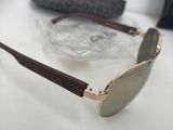 the sunglasses are made of wood and have a metal frame