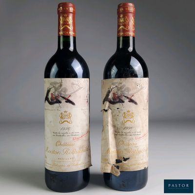 two bottles of wine sitting next to each other on a table