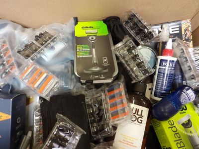 a box of assorted items that include a cell phone